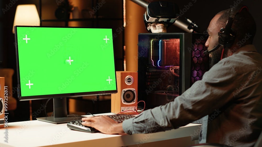 Aufkleber gamer using keyboard and mouse to play videogame on gaming pc isolated screen monitor. man in apartm