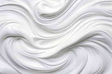 Obraz premium Close-up of smooth white cream texture with soft swirls
