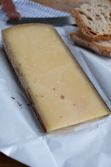 French aged in caves cheese Comte, made from unpasteurised cow milk Prestige,  Vieille Reserve close up