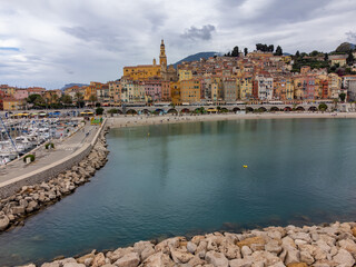 Aerial view on French Riviera, colorful Menton old city and marina on Mediterranean Sea near French-Italian border, travel destination, panoramic view from above
