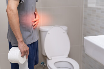 Constipation and diarrhea in bathroom. Hurt man touch belly  stomach ache painful. colon...