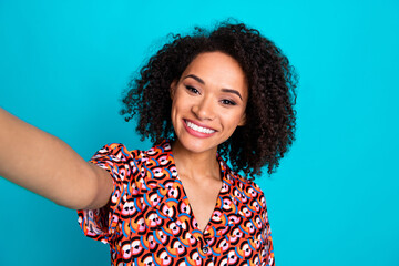 Fototapeta premium Photo of charming girly lady wear print shirt recording video vlog empty space isolated blue color background