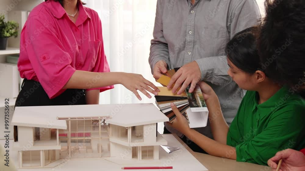 Poster slow motion home designer using architectural equipment draw a blueprint while interior designer sel