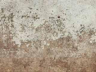 Peeling wall paint showing white and orange colors