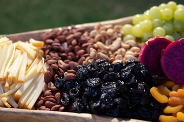 table with food breads, fruits cheeses party decoration healthy foods