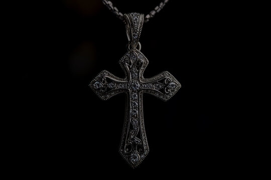 White gold cross pendant with filigree and diamonds, studio product photography, dark background.