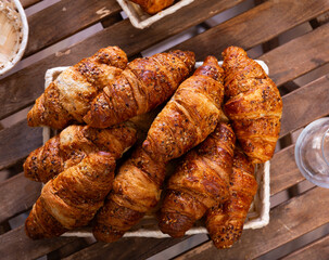 Appetizing fresh crispy croissant served for dessert