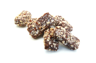 Almond butter chocolate bar candy isolated in bowl on white