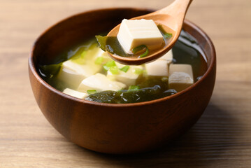 Miso soup with tofu, wakame seaweed and spring onion, Traditional Japanese soup