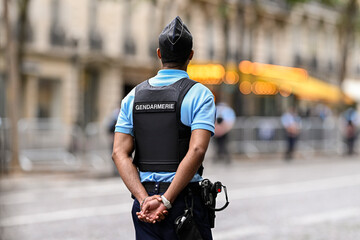 Illustration picture showing a male police officer (man) with uniform from gendarmerie ensuring security in Paris, France. French national policeman in action.