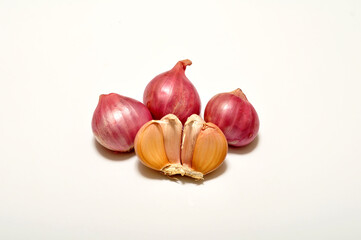 Shallots and garlic on a white background