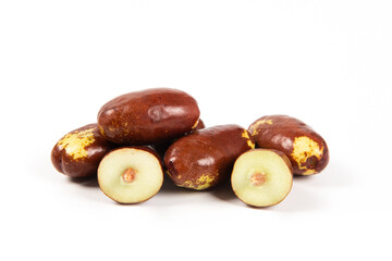 Fresh raw jujubes fruits isolated on white background.