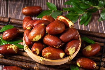 Fresh raw jujubes fruits on table.