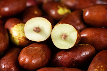 Fresh raw jujubes fruits on table.