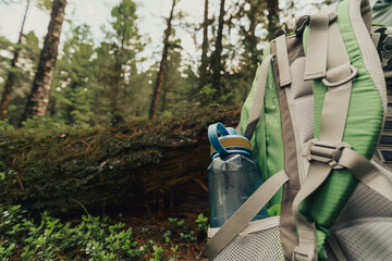 hiking water bottle in the backpack side