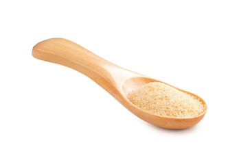 Dried ground organic garlic in a wooden spoon on a white backgro