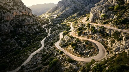 Winding Road in Aerial View Among Rocky Landscape