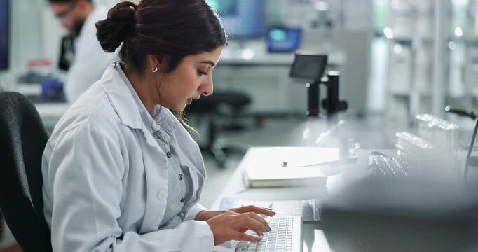 Scientist, keyboard and woman typing research for test, exam and drug development report in lab. Medical science, biotechnology and chemical engineer on computer for innovation, study or healthcare