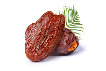Dry date fruit with palm leaf isolated