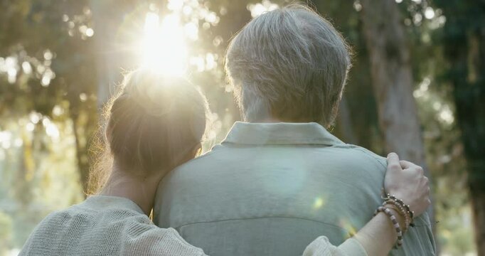 Hugging lovingly in the park