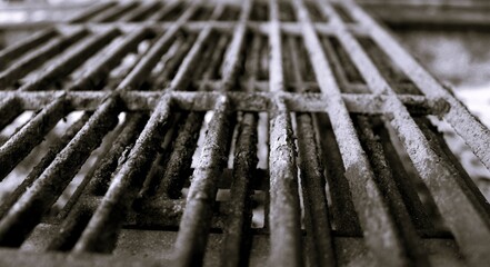 steel grating with heavy rust and corrosion oxidation texture grunge char background