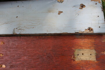 Textured wooden backdrop made of rustic brown and blue planks background