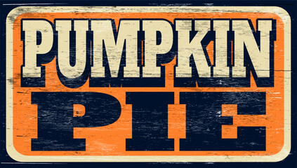 Fototapeta premium Aged and worn pumpkin pie sign on wood