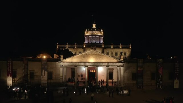 This is the Hospicio Caba&ntilde;as, a historic building in Guadalajara Mexico. The drone flies over the building showing us the magnificent building illuminated by the lights of an event at night