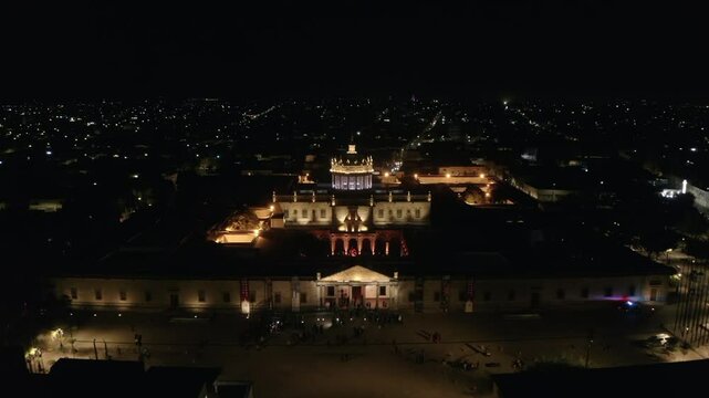 This is the Hospicio Caba&ntilde;as, a historic building in Guadalajara Mexico. The drone flies over the building showing us the magnificent building illuminated by the lights of an event at night