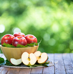 Wide Angle Red Japanese Apple in Wooden tray, Shinano Red and Sansa  Apple on wooden background. 