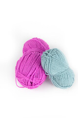 wool ball pink and blue isolated on white 