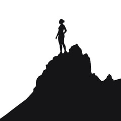 a woman on top of the mountain