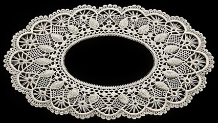 Elegant white lace doily on black background