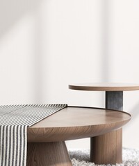 Round wooden podium table with black stripe throw blanket in sunlight on white wall for luxury,...