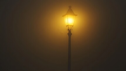 A Street Light Illuminates the Foggy Night