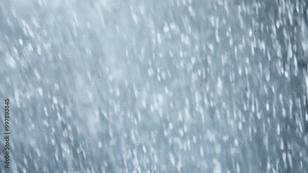 Poster snow blowing fast and changing direction as the wind picks up speed. the strength of the wind is inc