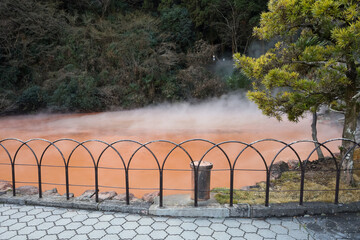 red water hot spring. One of the eight hot springs is landmark in touris location at Beppu, Oita, Japan.