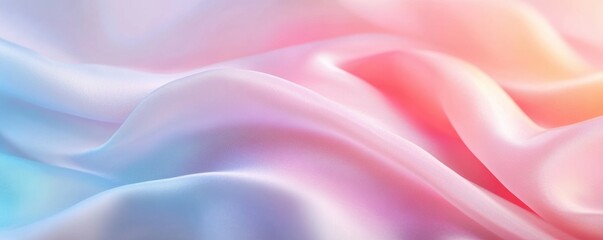 Obraz premium A soft, flowing fabric showcases smooth waves with a delicate blend of pastel colors, creating a serene and elegant visual effect.