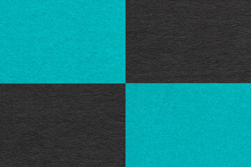 Fototapeta premium Texture craft turquoise and black paper background with cells pattern, macro. Vintage kraft cerulean cardboard.