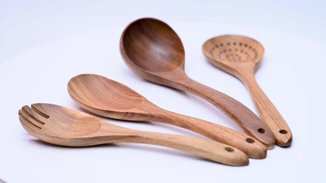 wooden kitchen spatulas on white background