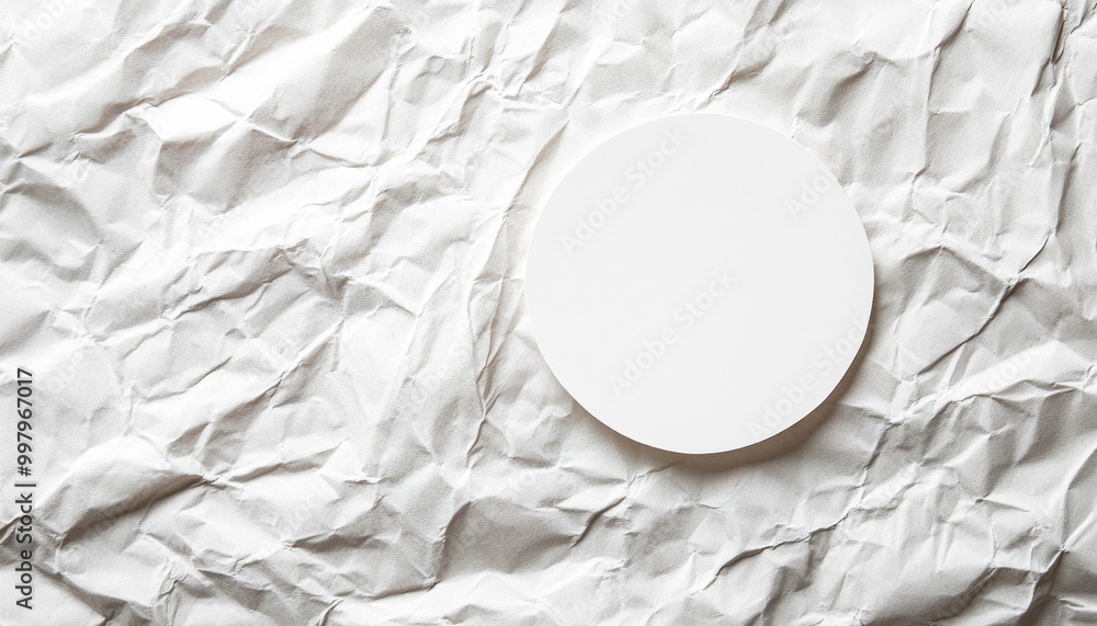 Poster white empty circle on a crumpled paper background is waiting for your content