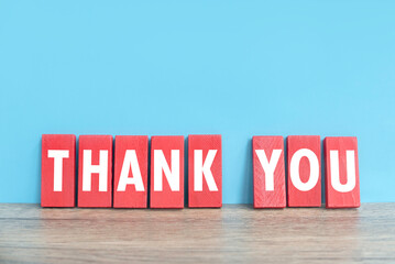 red Wooden rectangle sign of Thank You.