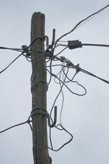Electric pole with unorganized wires