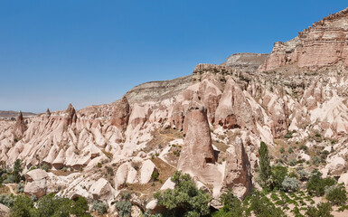 Fototapeta premium Panoramic rock formation in Cappadocia. Rose valley. Goreme, Turkey landmark