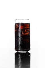 vertical view cold brew coffee with striking contrast enhances the color of the coffee looking fresh isolated on a white background. Space for text