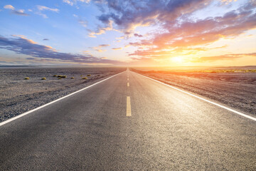 Asphalt highway road and desert with sky clouds nature landscape at sunset. Car background.