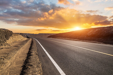 Asphalt highway road with sky clouds nature landscape at sunset. car background.