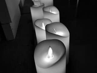 Burning candles black and white background