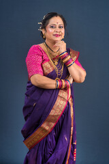 Portrait of traditional Indian woman wearing saree