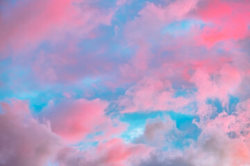 Fairytale sky with sugar cotton pink clouds in a dreamy background. Fantasy environment. Amazing heaven. Nature wallpaper. Idyllic backdrop. Romantic atmosphere. Textured abstract. High quality photo
